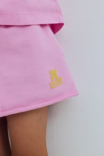 The New Society - Tns logo short - Pink lavander